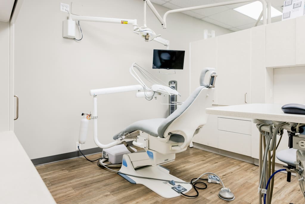 Modern dental treatment room with specialist equipment